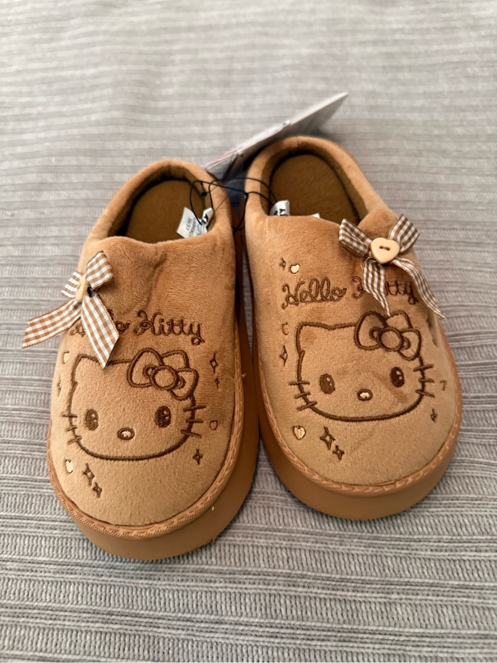 Hello Kitty Women’s Brown Slip-On Shoes with Bow Detail size 6.5